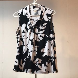 Calvin Klein black and white knot detail blue top